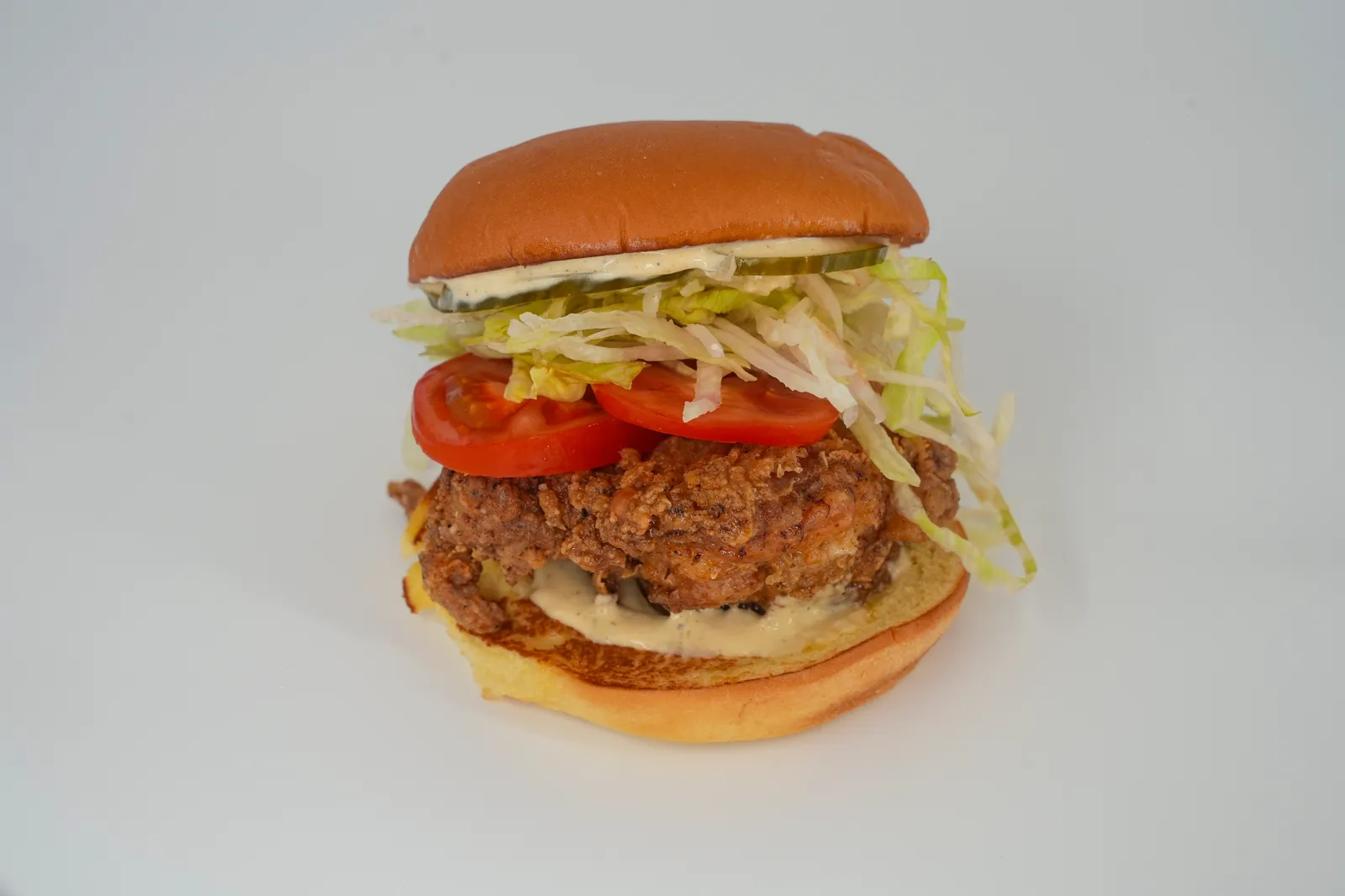 BUNEX Special Chicken Burger mit Salat und Tomate